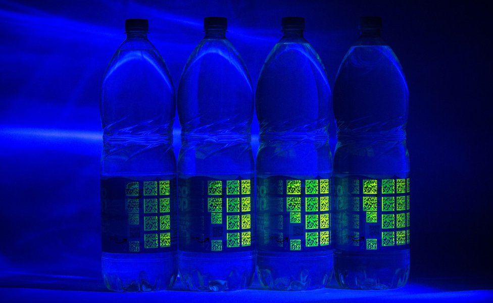 Bottles with Polytag's UV tags